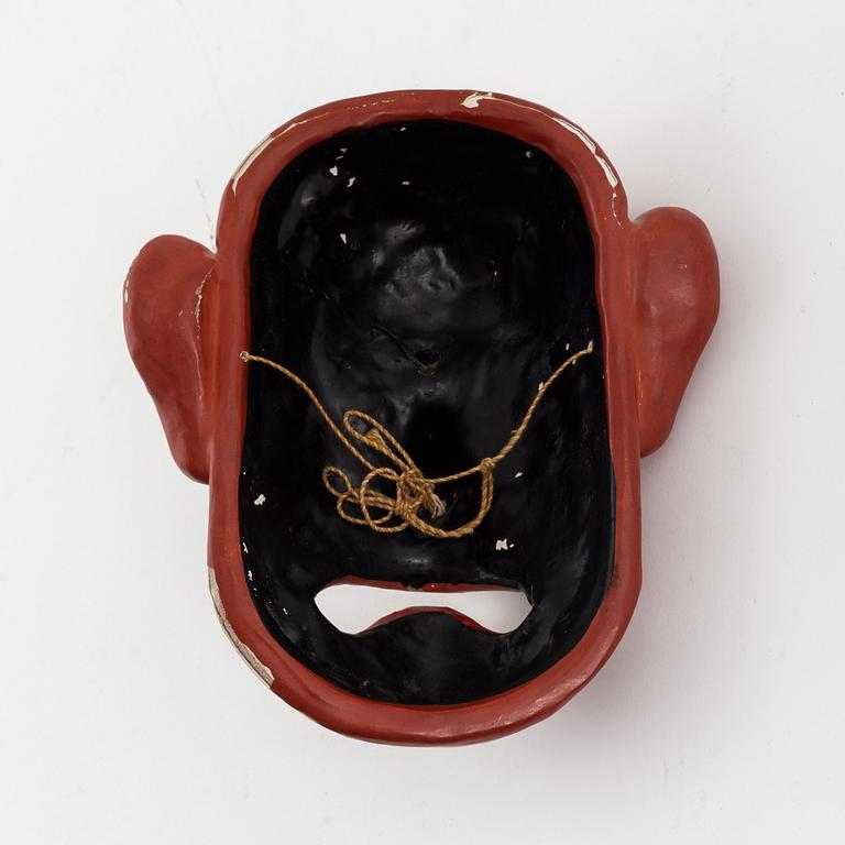 A Japanese masque, circa 1900.