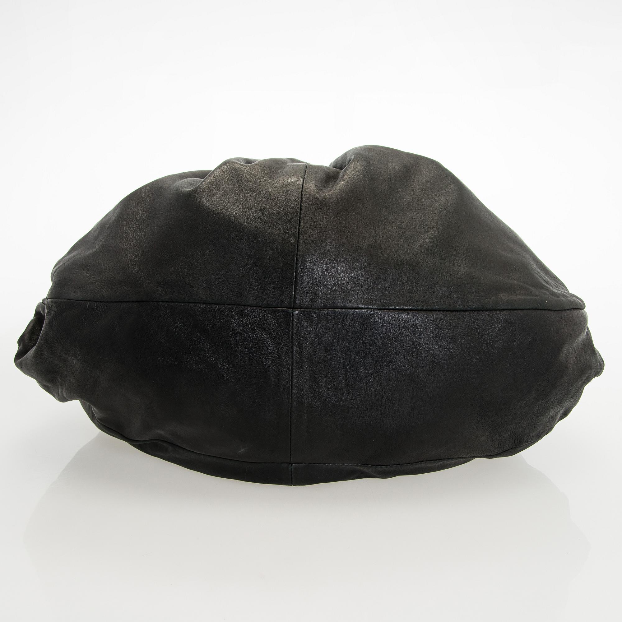 Emporio Armani, a leather bag.