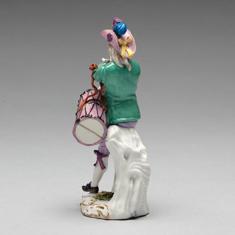 A Meissen figure of a musician, 18th Century.