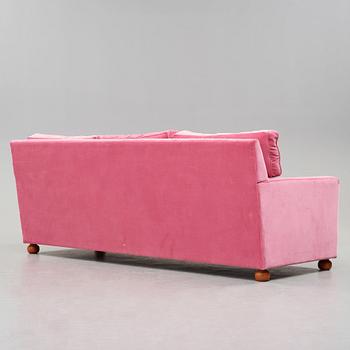 Josef Frank, a pink velvet upholstered three seated sofa, Svenskt Tenn, model 3031.