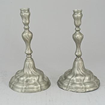 A pair of pewter rococo candlesticks. 18th century.