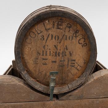 A pair of oak wine casks on stands, early 20th century.