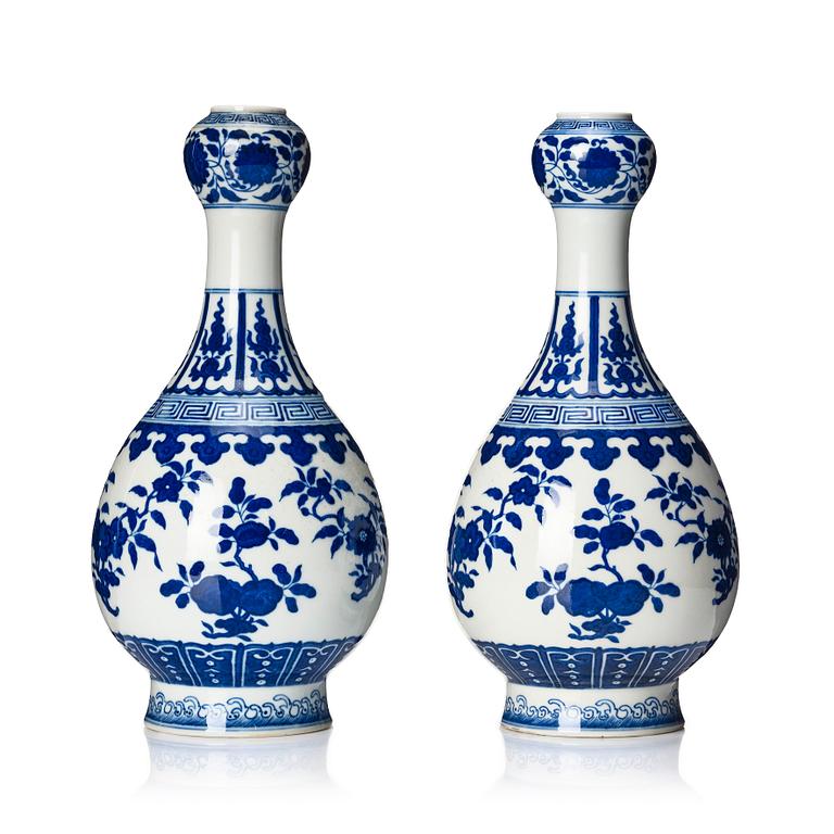 A pair of Chinese blue and white vases, late Qing dynasty/Republic with Qianlong seal mark.