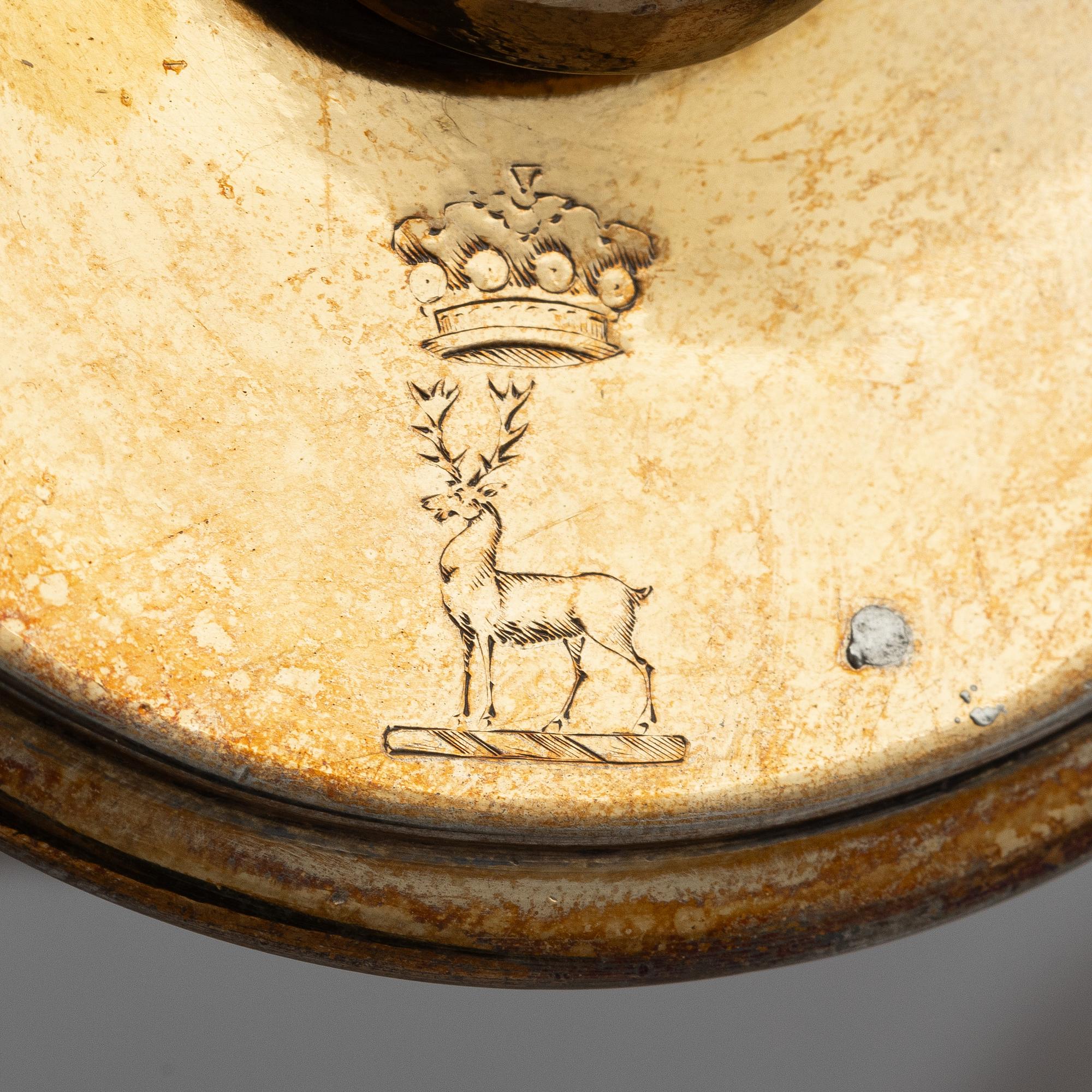An English silver-gilt teapot with stand and burner, mark of Richard Sibley I, London 1825.