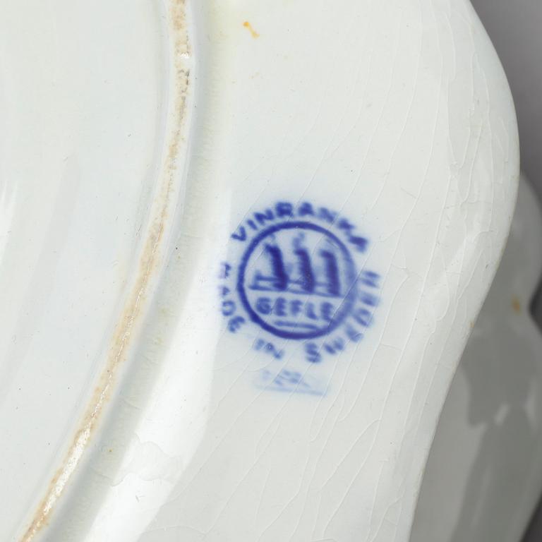 77 pieces of earthenware tableware by Arthur Percy for Gustavsberg, model "Vinranka", first half of the 20th century.