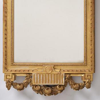 A Gustavian giltwood mirror, Stockholm, late 18th century.