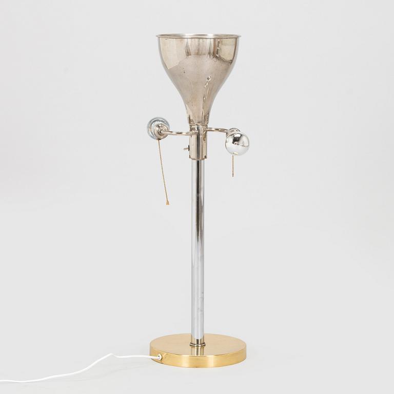A mid-20th century floor/tablelamp, France.