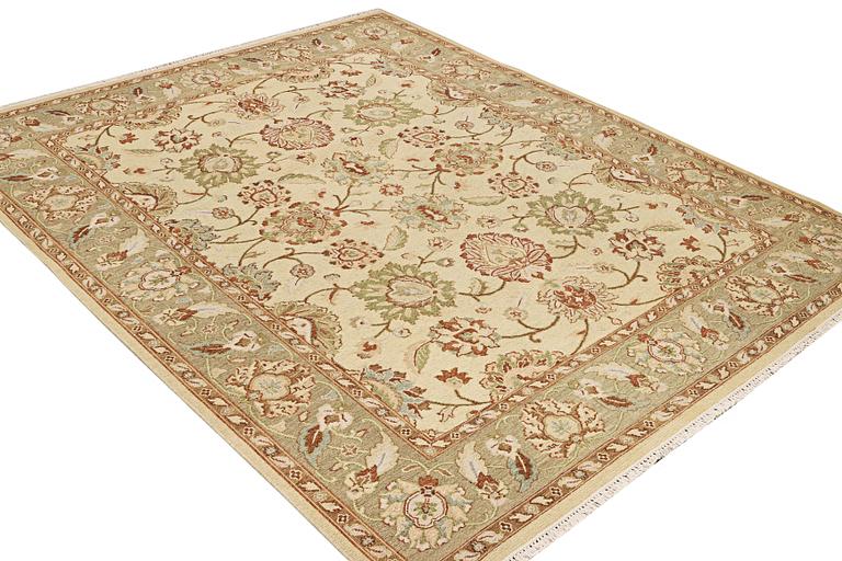 An oriental carpet with Mamluk design, c. 294 x 250 cm.