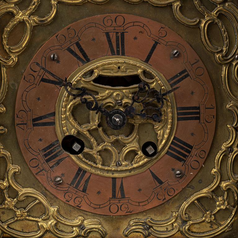 An 18th century table clock.