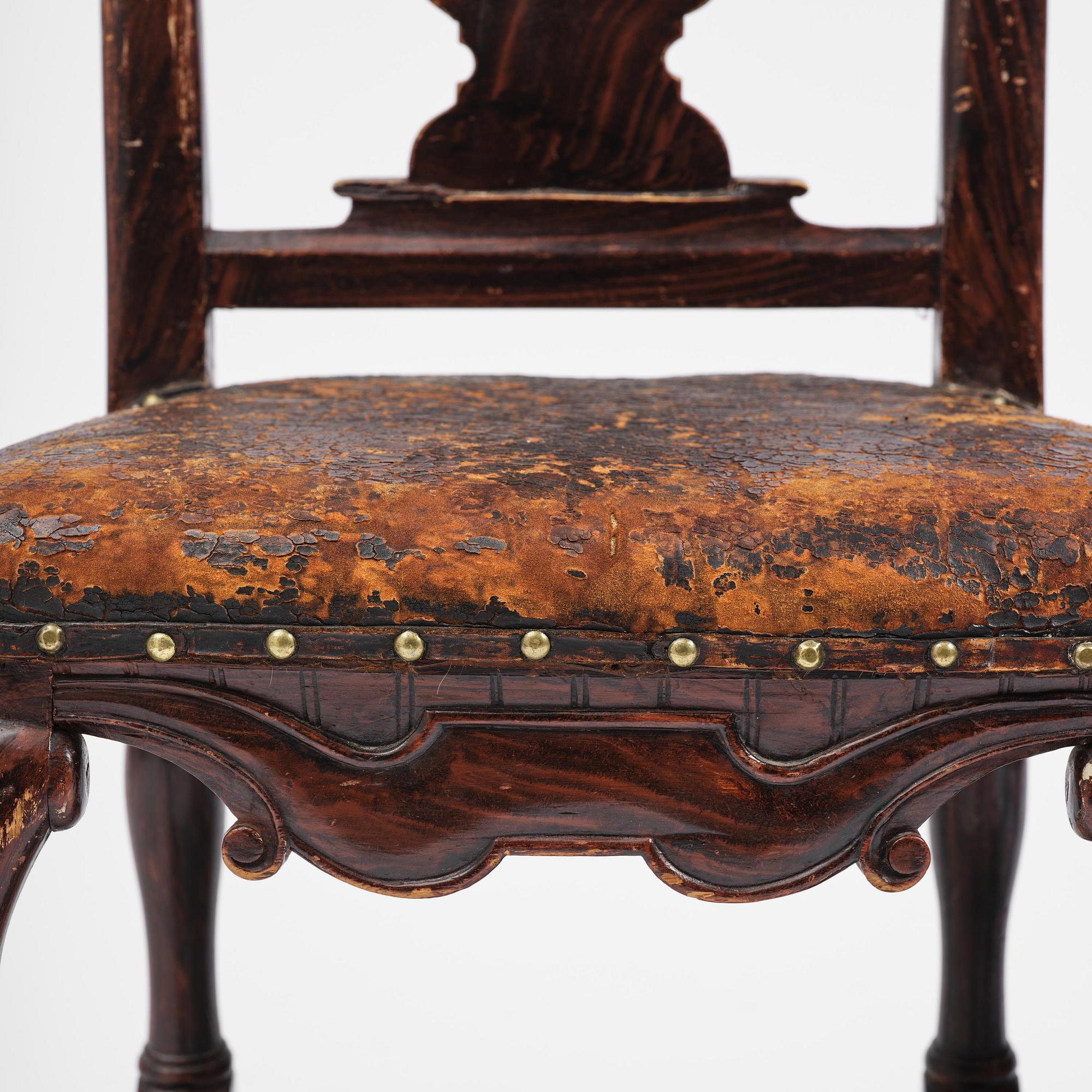 A pair of late baroque faux bois-painted chairs, attributed to M. Meling, 1730/40's.