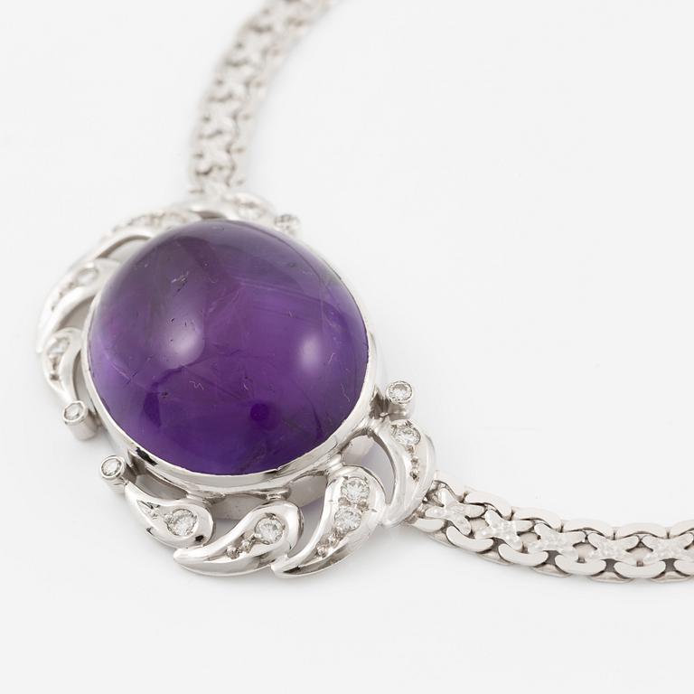 Necklace in 18K white gold with a cabochon-cut amethyst and round brilliant-cut diamonds.