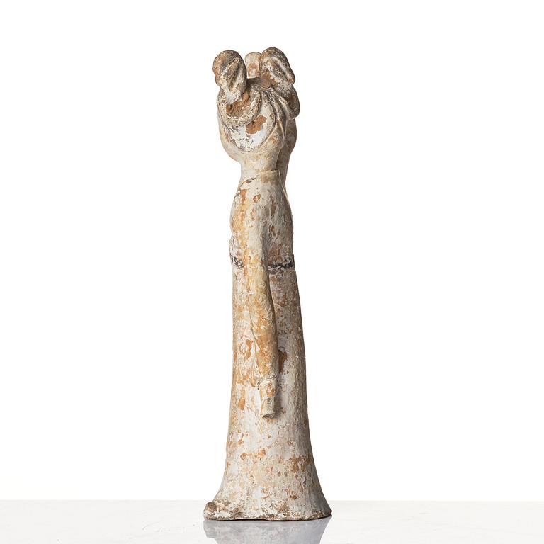 A painted pottery figure of a female dancer, Tang dynasty (608-906).