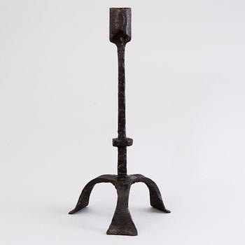 A CANDLESTICK, iron, 18th century or older.