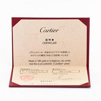 Cartier, sormus, "C de Cartier", 18K valkokultaa ja timantteja, yht. n. 0.10 ct.
