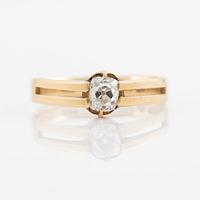 Ring 18K guld med en gammalslipad diamant.
