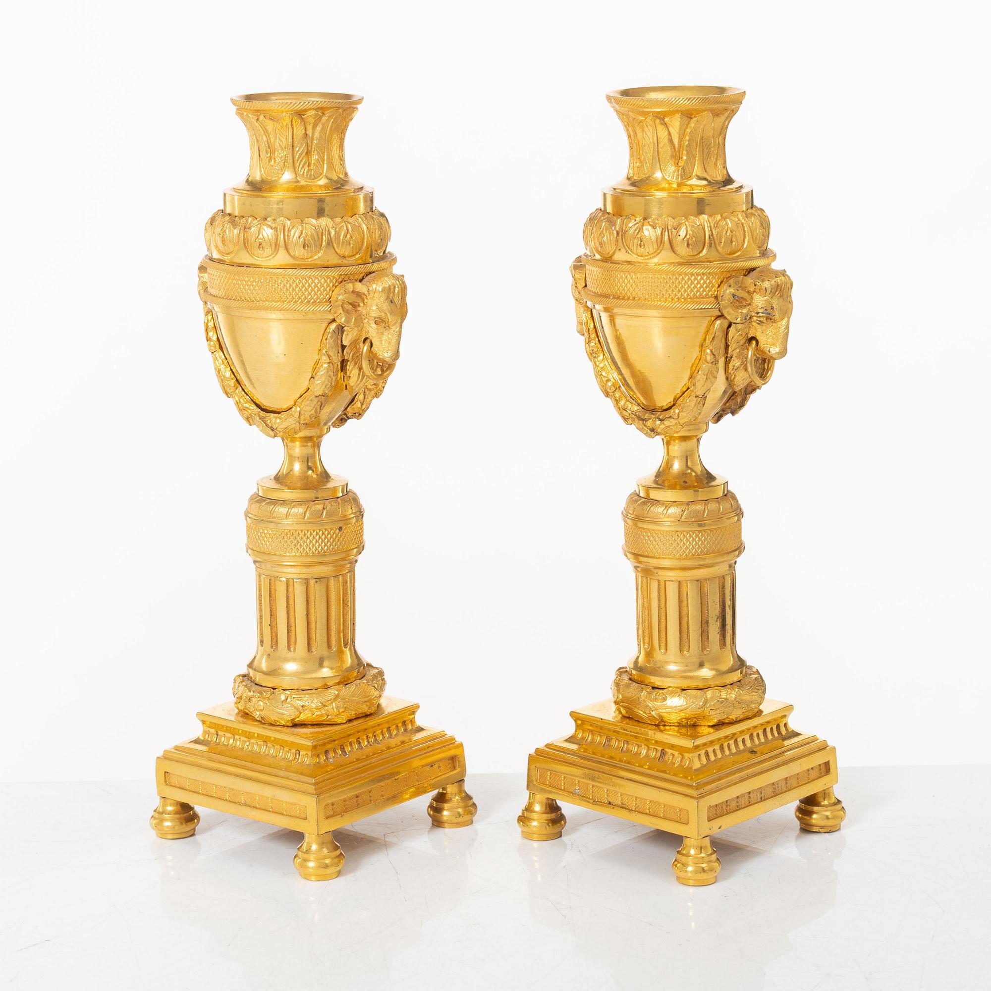 A pair of French Louis XVI style gilt-bronze casolettes, later part 18th century.