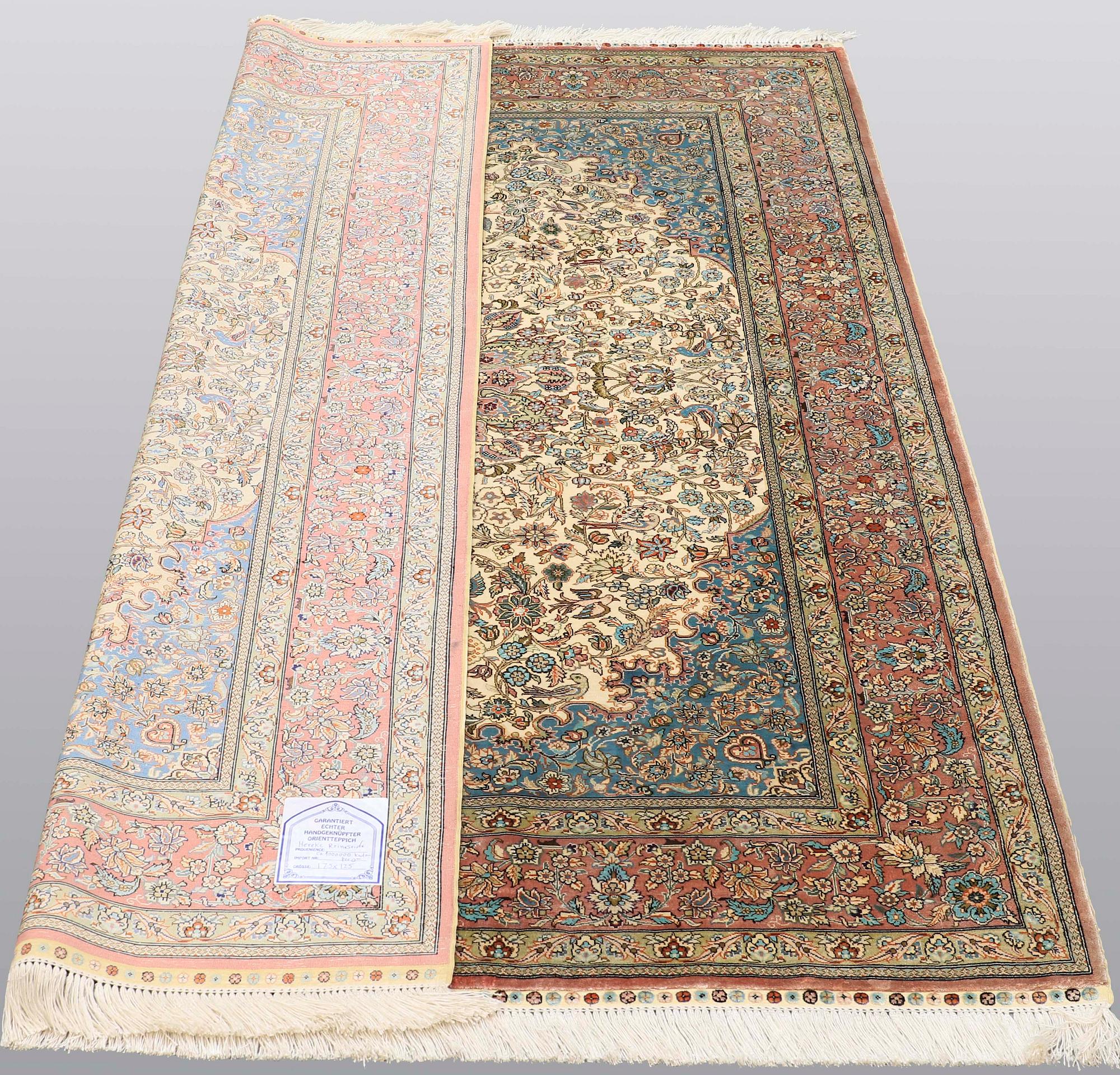 A rug, Figural Oriental silk,  signed, ca 175 x 125 cm.