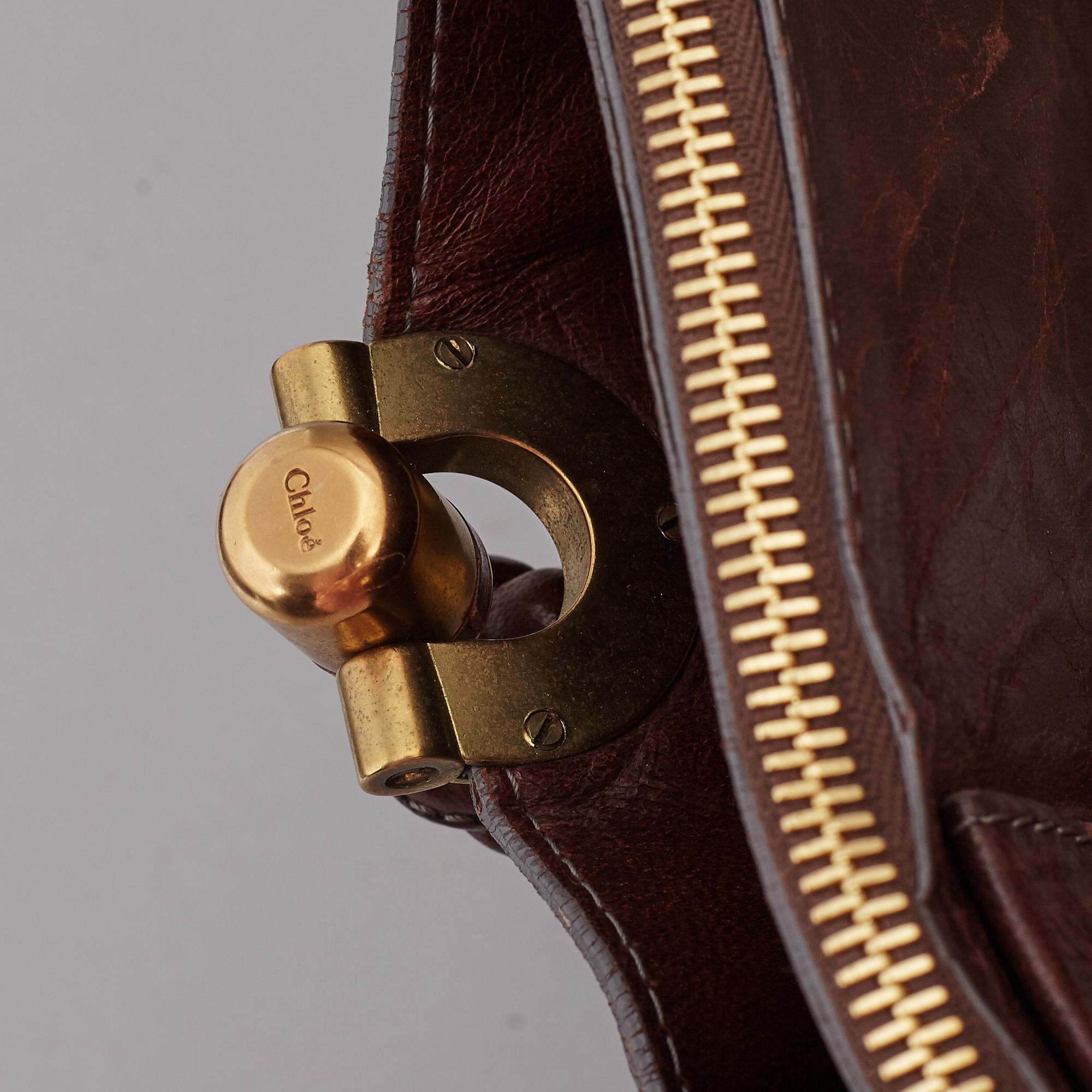 CHLOÉ, a brown leather bag.