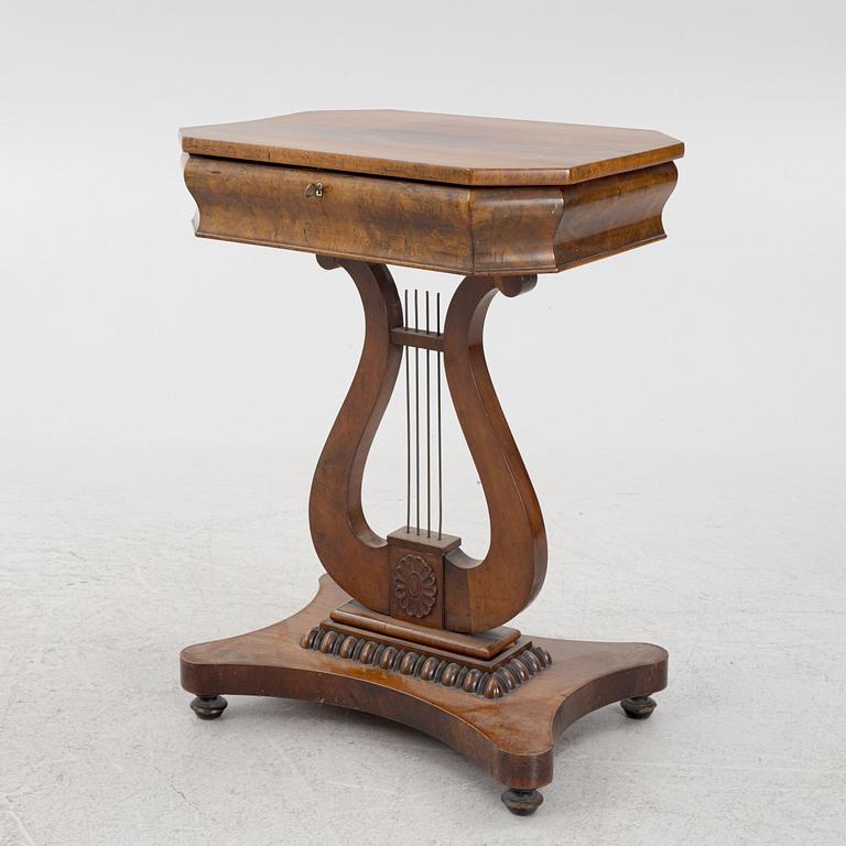 An Empire mahogany sewing table, First part of the 19th Century.