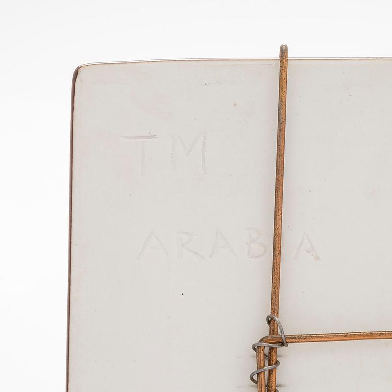 Toini Muona, a stoneware relief for Arabia, signed TM Arabia.