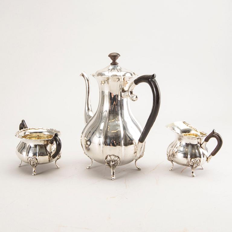 A 20th century German three parts silver tea service with Swedish import stamps.