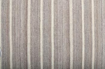 A FLATWEAVE RUG, 302 x 250 cm.