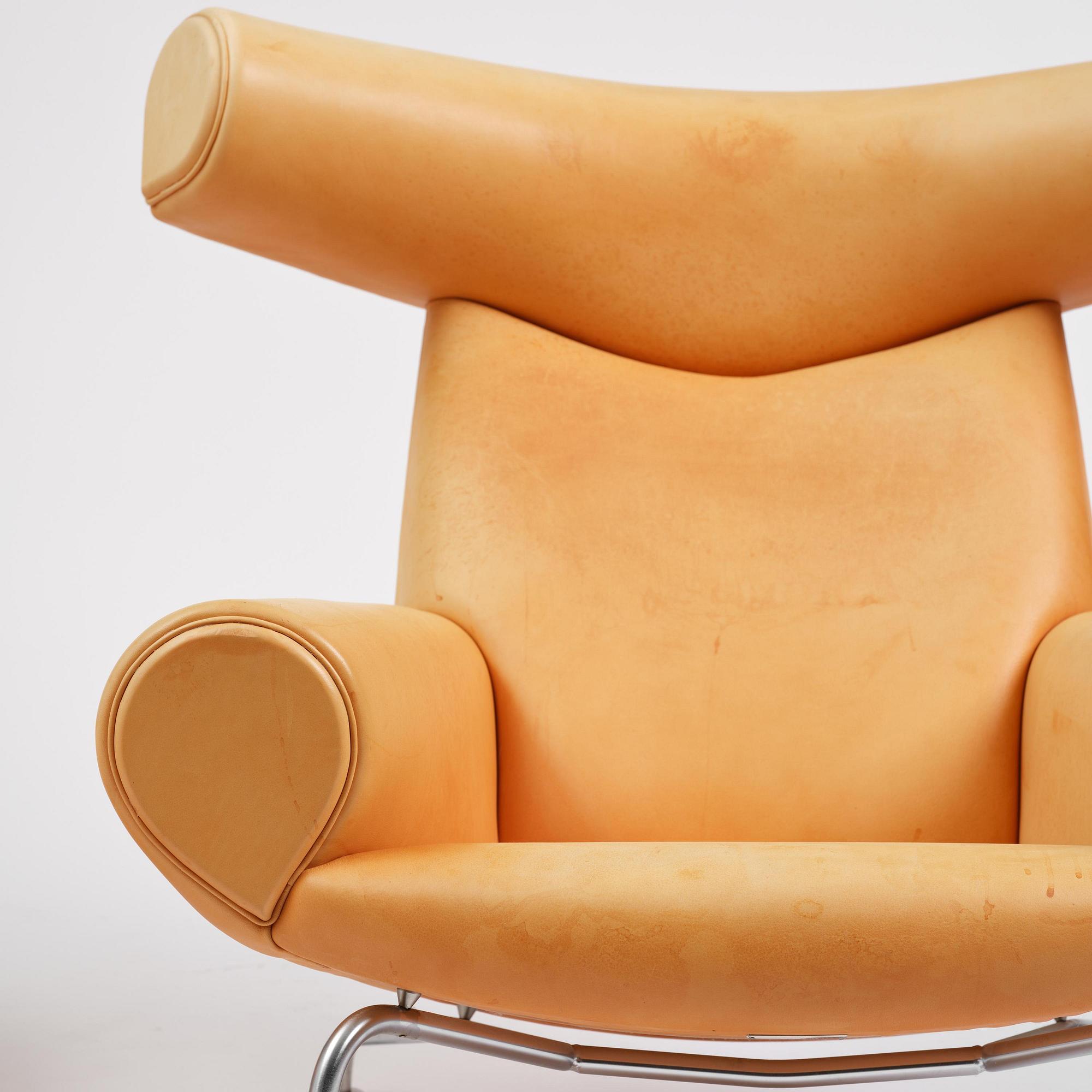 Hans J. Wegner, an “Ox Chair” with footstool, Erik Jørgensen, Denmark.