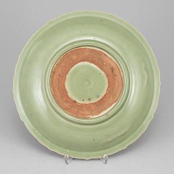 A celadon glazed ceramic dish, for South east asian market, 17th century.