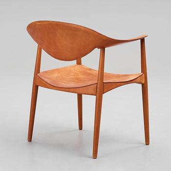 Aksel Bender Madsen & Ejner Larsen, a teak and leather "Metropolitan Chair", Willy Beck, Denmark 1950-60's.