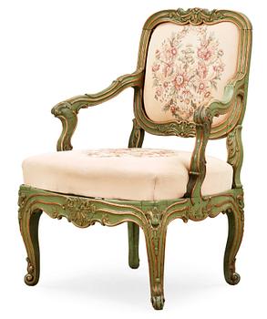 475. A Rococo 18th century armchair.