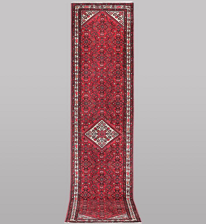 A runner carpet, Hosseinabad, ca 393 x 82 cm.