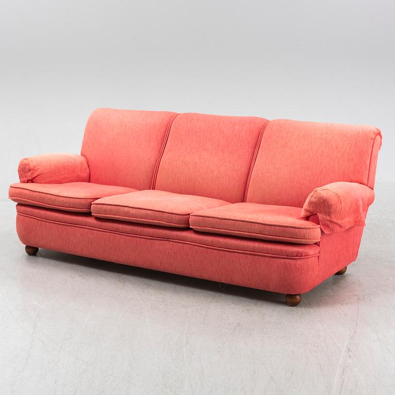 A model 703 sofa by Josef Frank for Firma Svenskt Tenn.