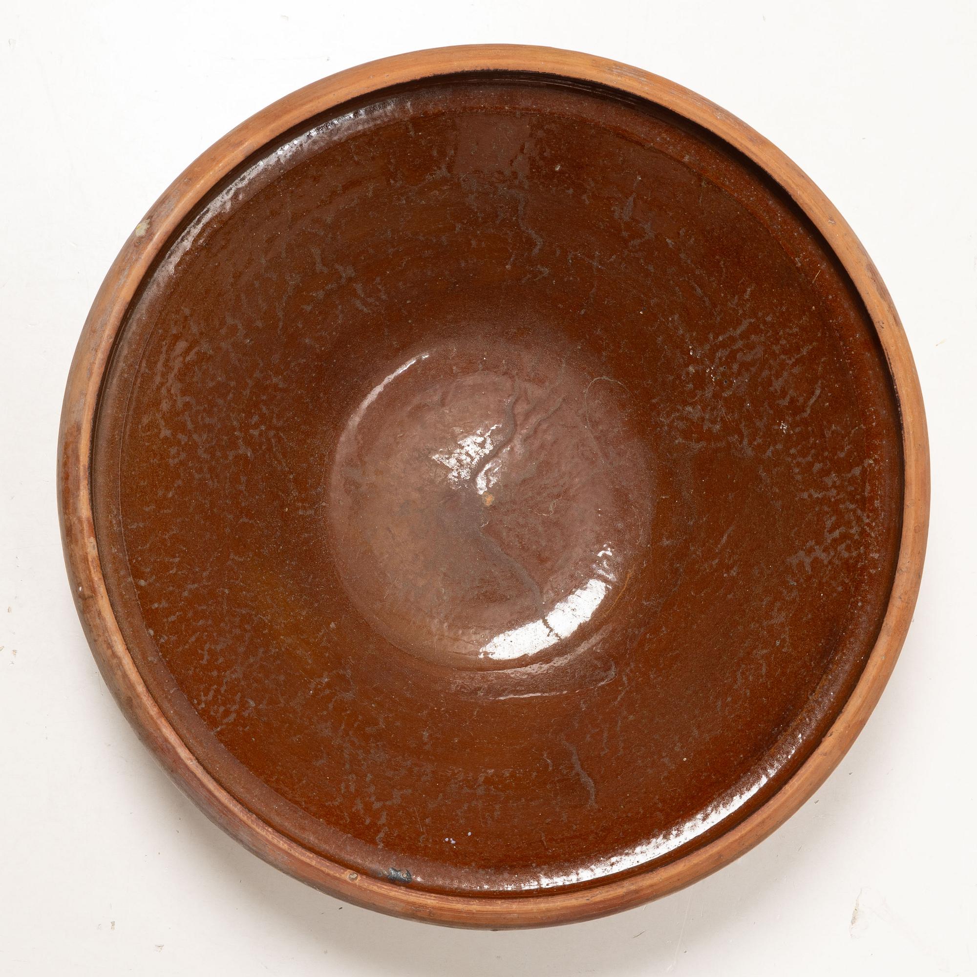 A earthenware dish, circa 1900.