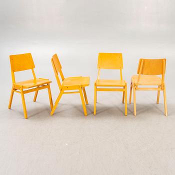 A set of 12 beech stackable chairs mid 1900s.