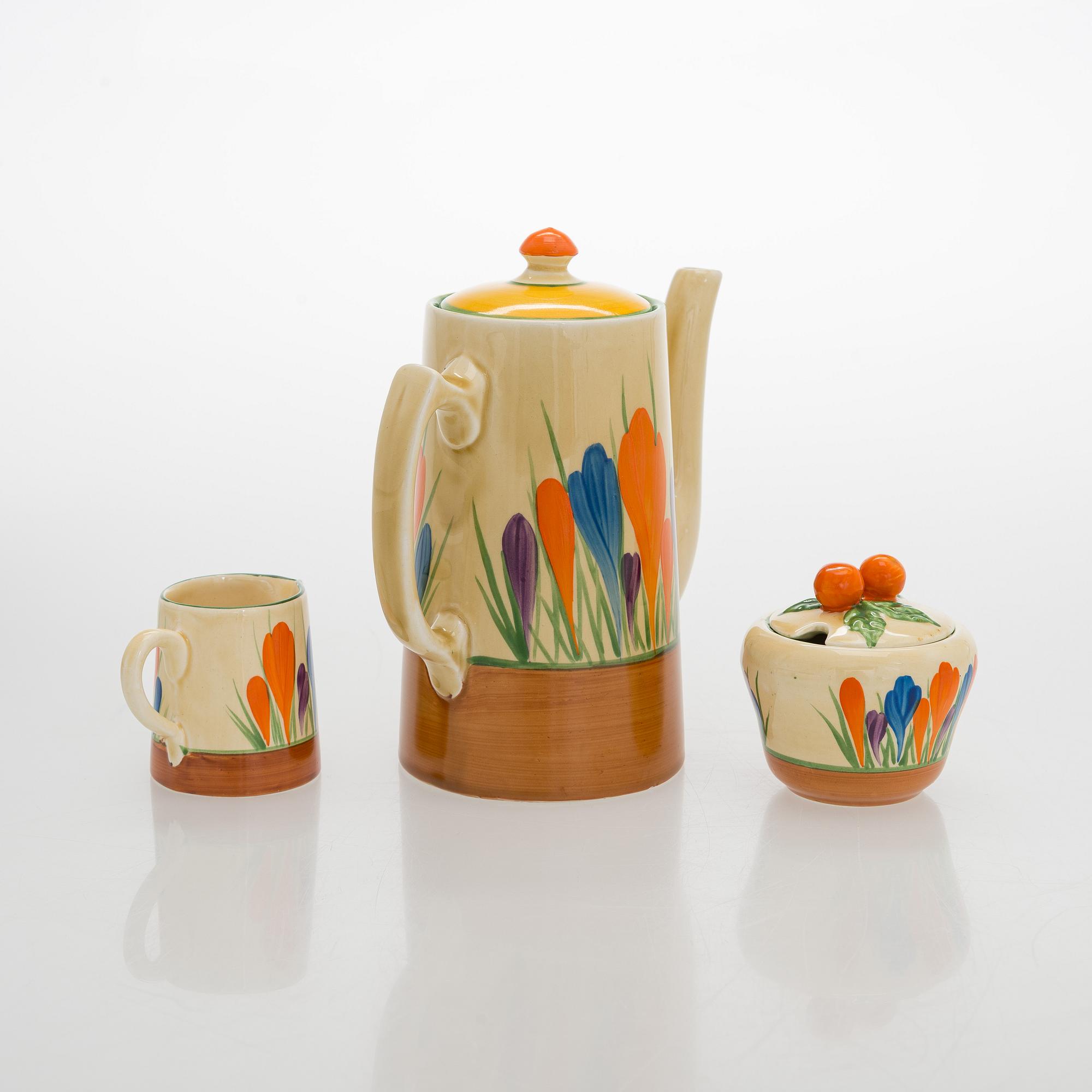 Clarice Cliff, 10-piece coffee service, stamped "Crocus", England.