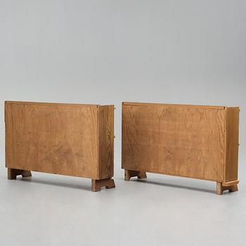 Axel Einar Hjorth, a pair of stained pine book cases "Sport", Nordiska Kompaniet, Sweden 1930's.