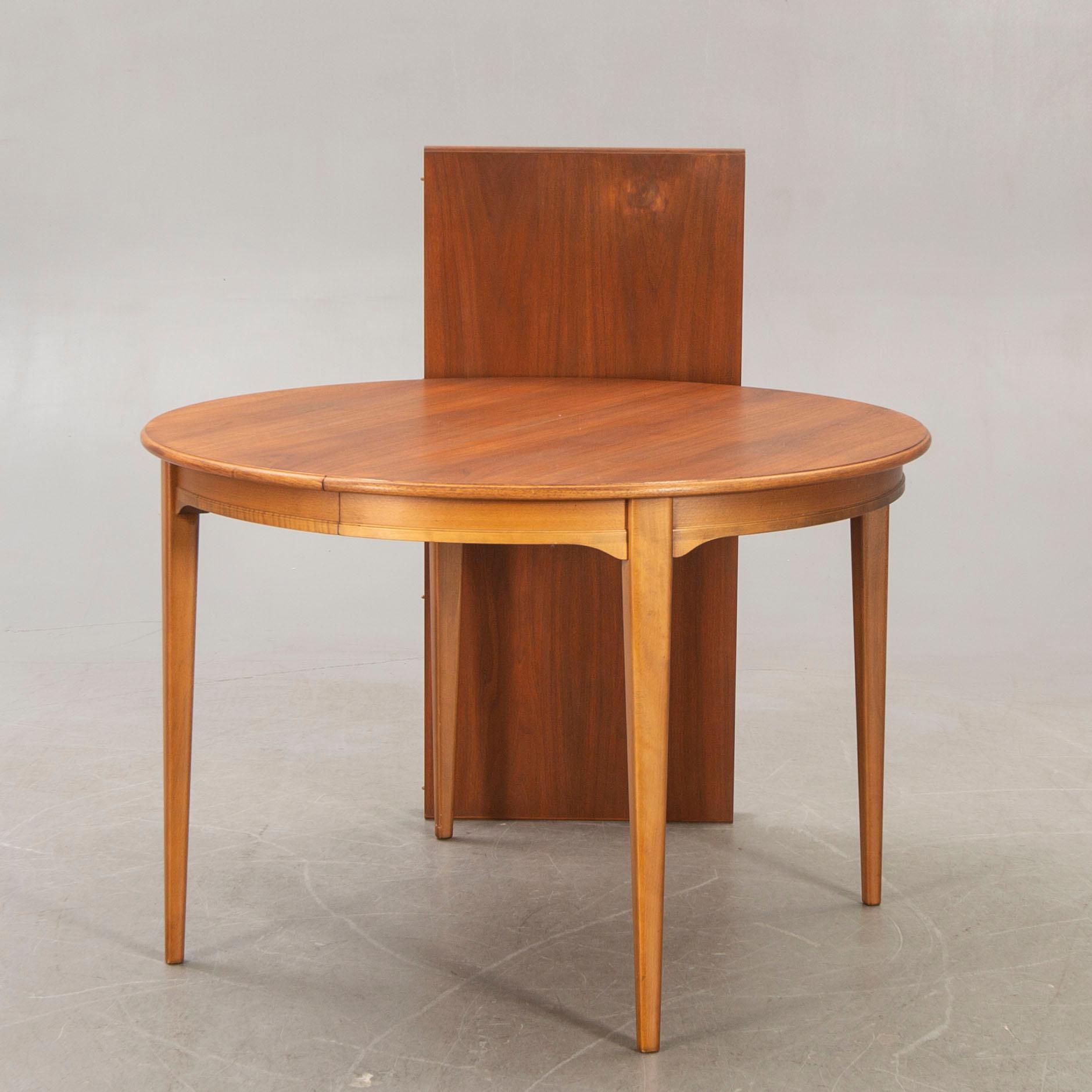 A 1960s Svante Skogh walnut dining table.