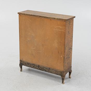 A 1920's/30's birch-veneered bookcase.