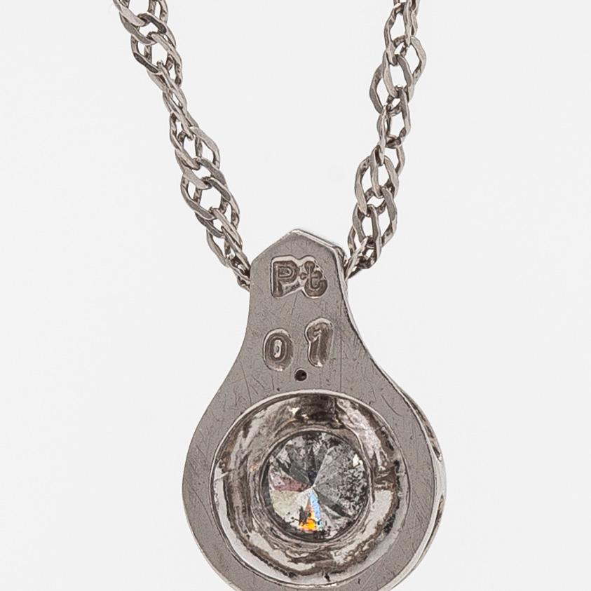 A platinum necklace, with a round brilliant-cut diamond ca. 0.10 ct.