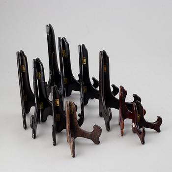 19 Chinese wooden stands, 20th century.