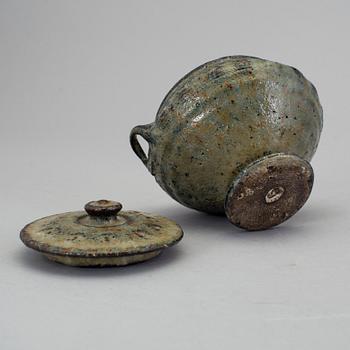 a stoneware bowl with lid designed by Gutte Eriksen, signed.