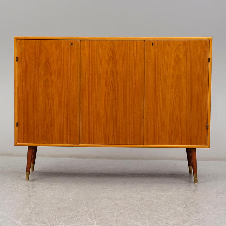 A late 20th Century teak veneered sideboard.