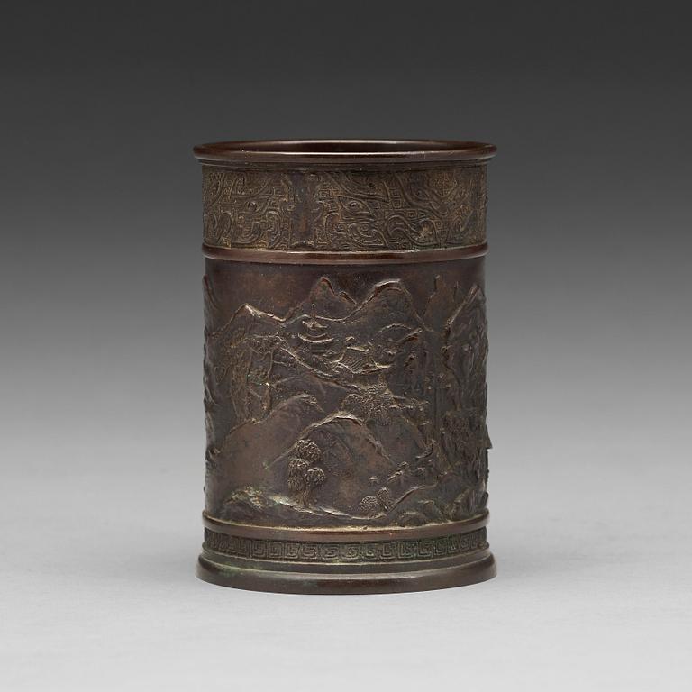 A bronze brush pot, Qing dynasty, circa 1900.