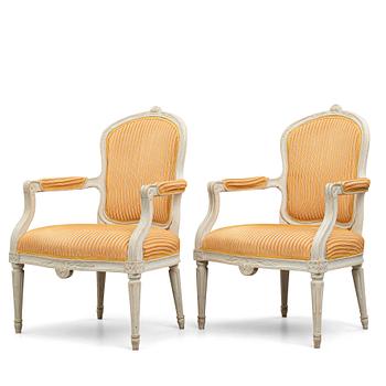 67. A pair of Gustavian 1770/80's armchairs.