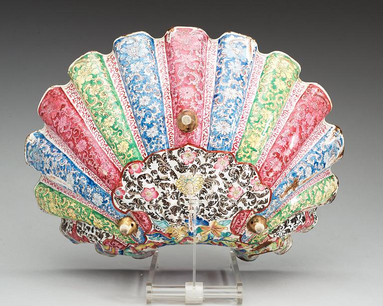 An enamel on copper clam-shaped bowl, Qing dynasty, 18th Century.