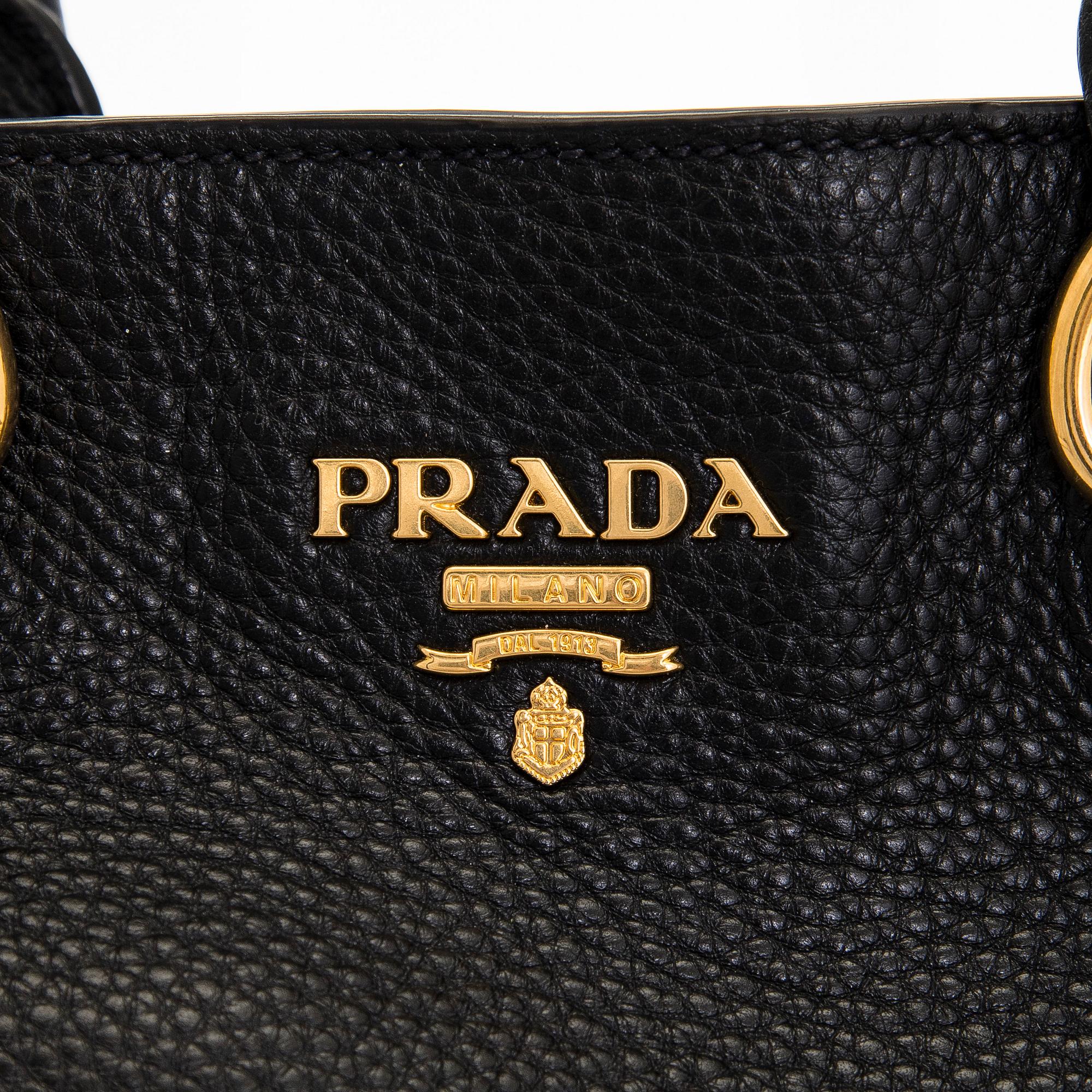 Prada, A 'Vitello Daino Tote' bag.