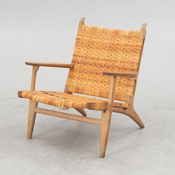 Hans J. Wegner, a model CH 27 lounge chair, Carl Hanse &Son, Denmark.