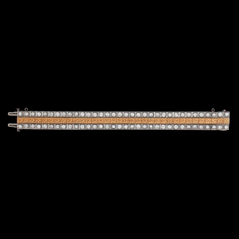 ARMBAND, 68 briljantslipade diamanter, tot. ca 10 ct. USA, ca 1960-tal.
