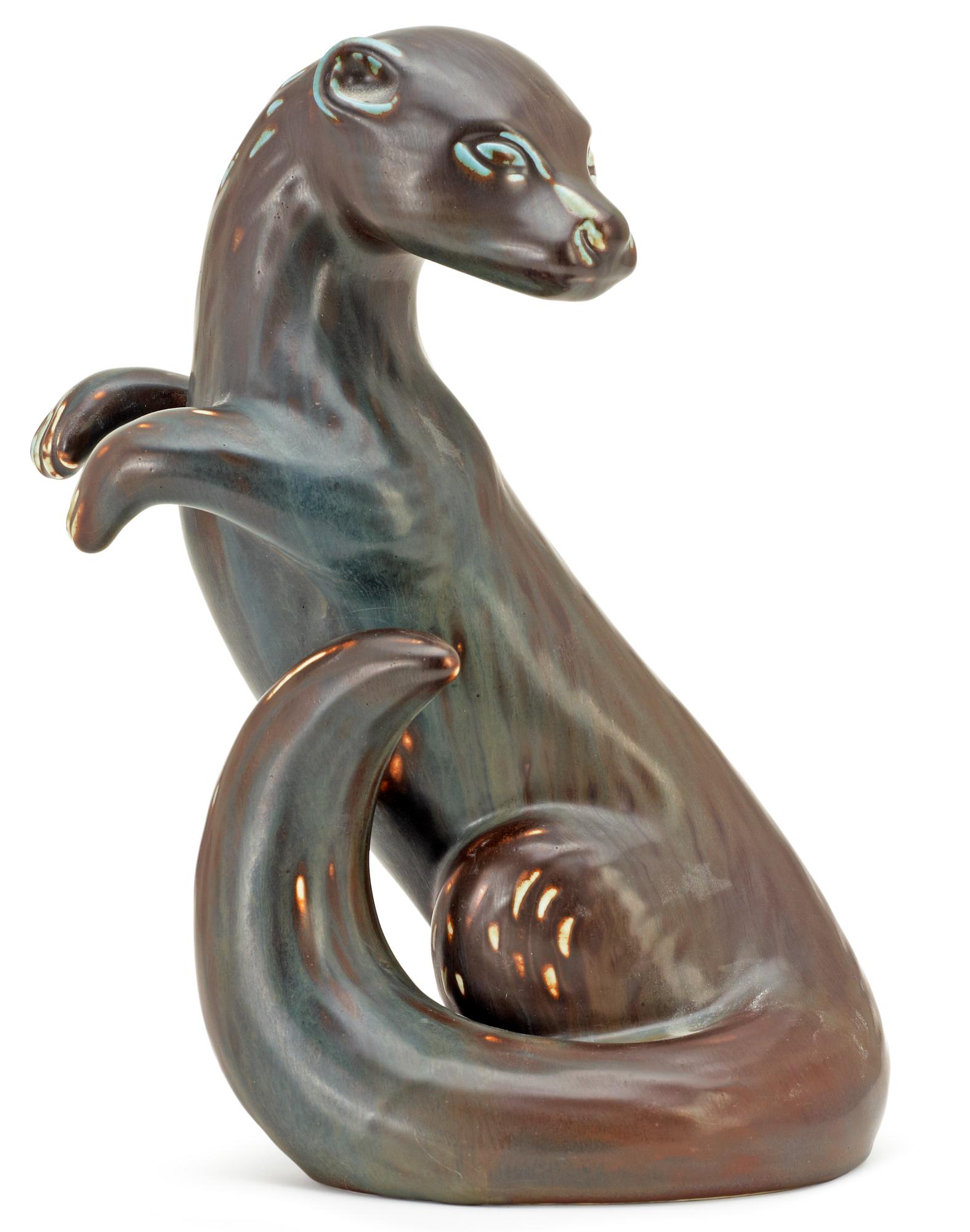 A Gunnar Nylund stoneware figure of a mustelids, Rörstrand.