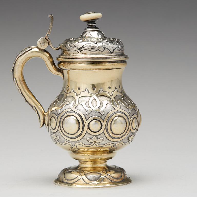 A Russian 19th century parcel-gilt silver tankard, unidentified makers mark, St. Petersburg 1864.